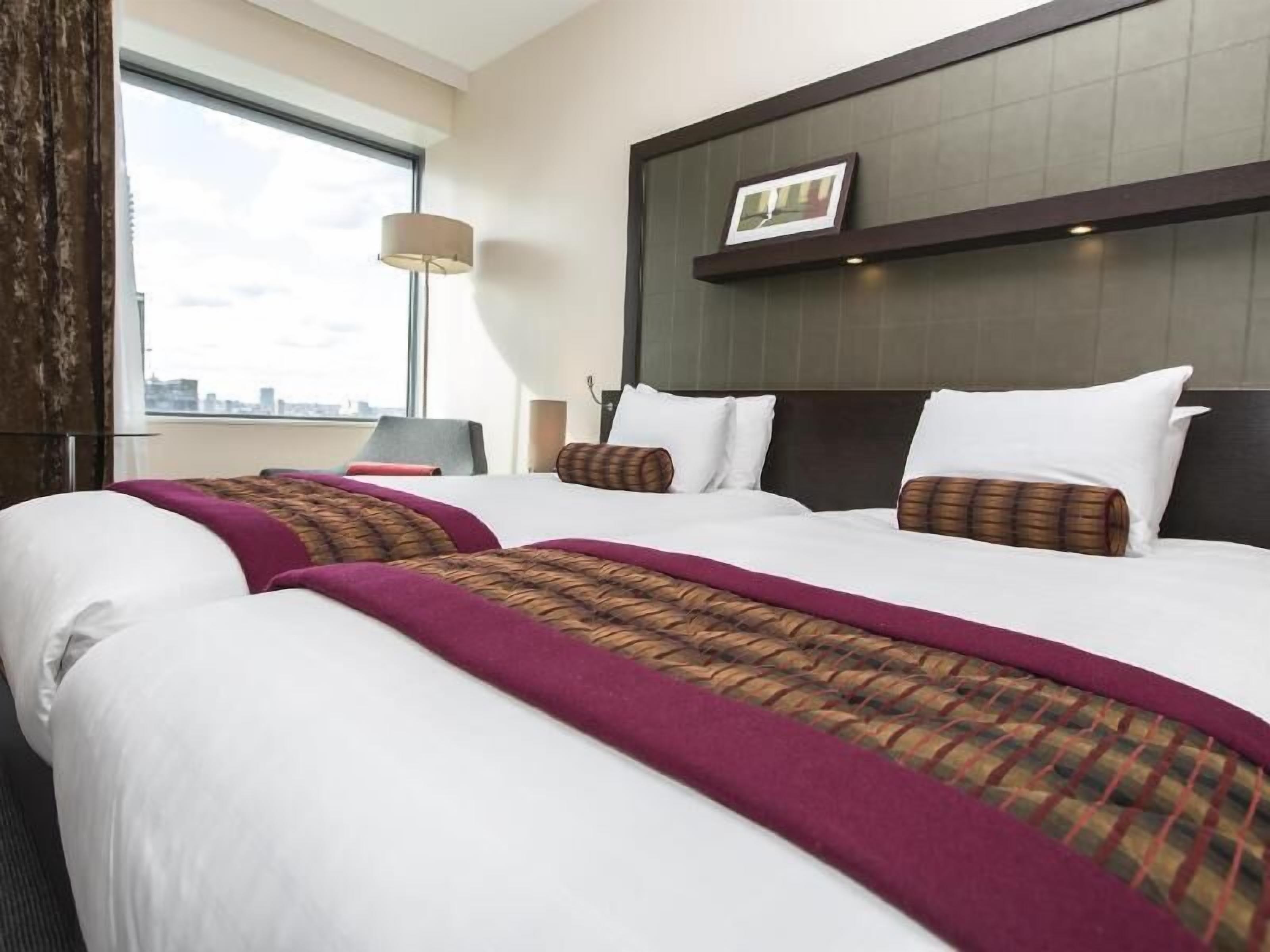 Hypo-allergenic bedding, in-room safe, desk, laptop workspace