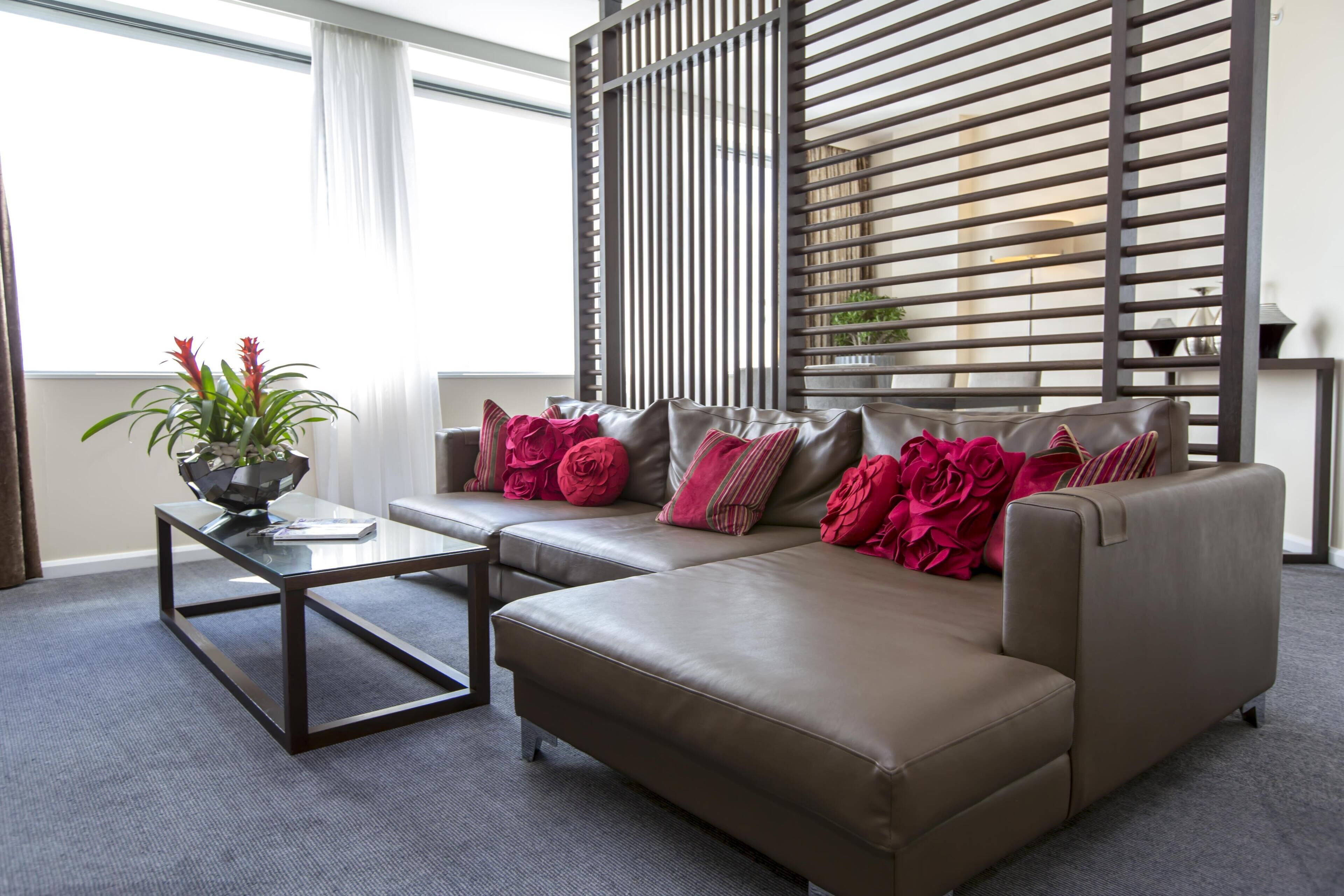 Executive Suite, 1 King Bed | Living area | 48-inch LCD TV with cable channels, TV