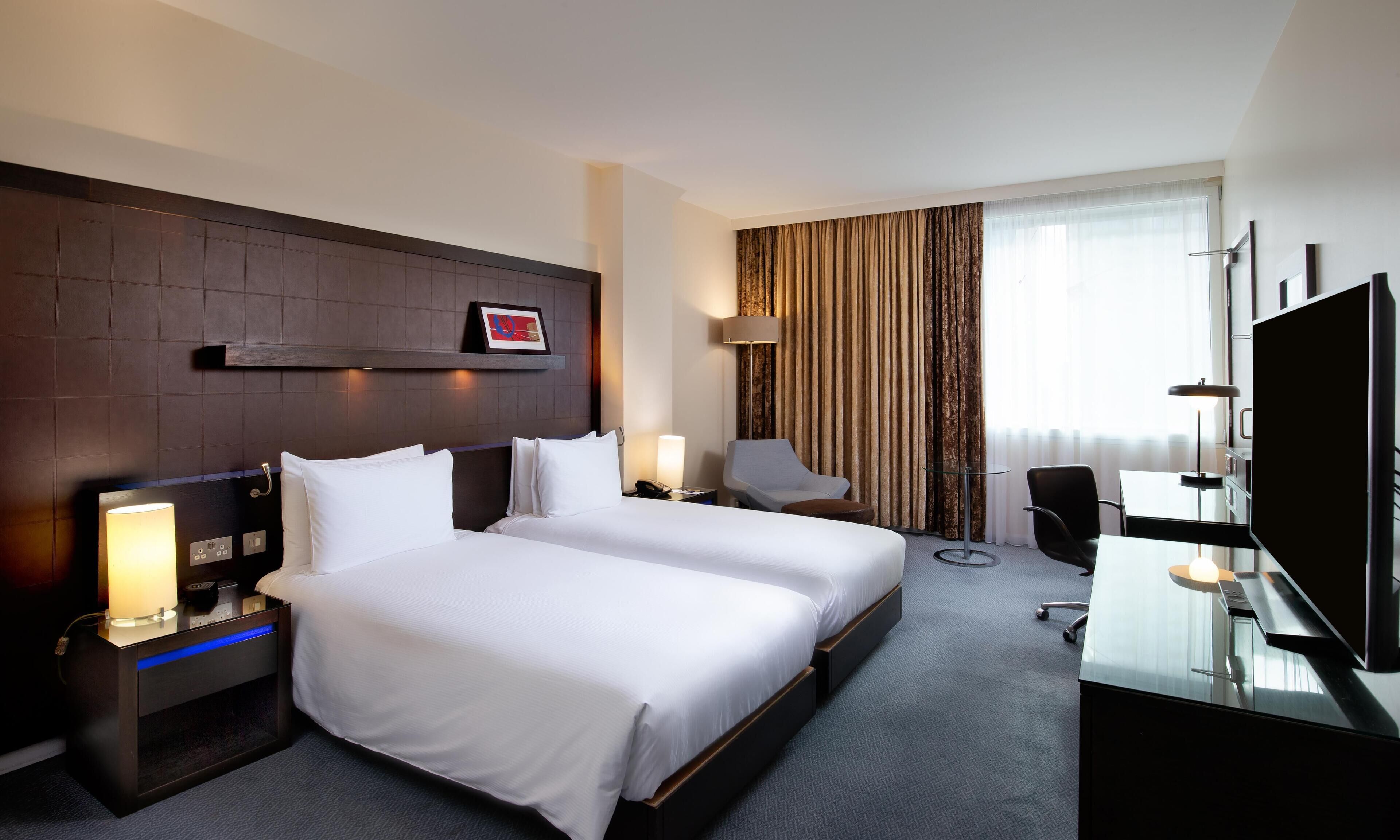 Hypo-allergenic bedding, in-room safe, desk, laptop workspace