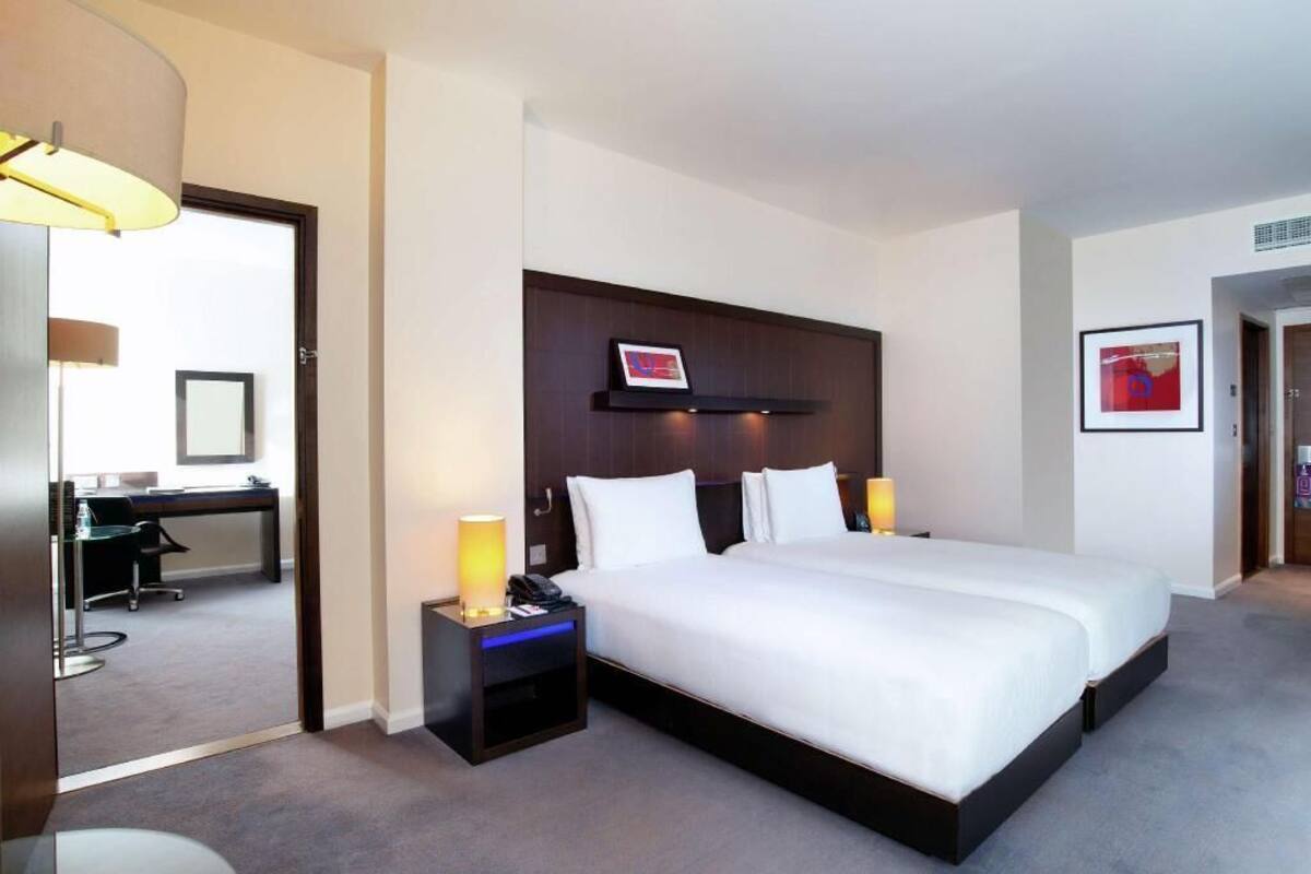 Hypo-allergenic bedding, in-room safe, desk, laptop workspace