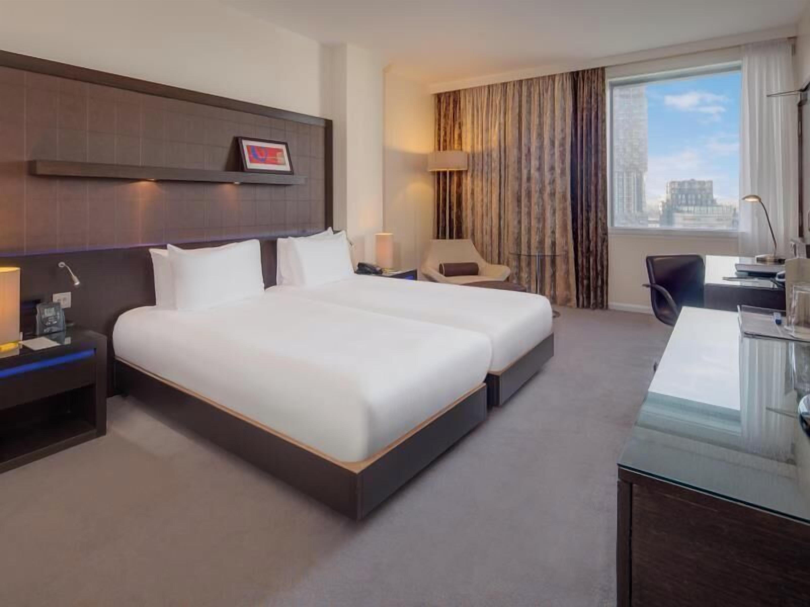 Hypo-allergenic bedding, in-room safe, desk, laptop workspace