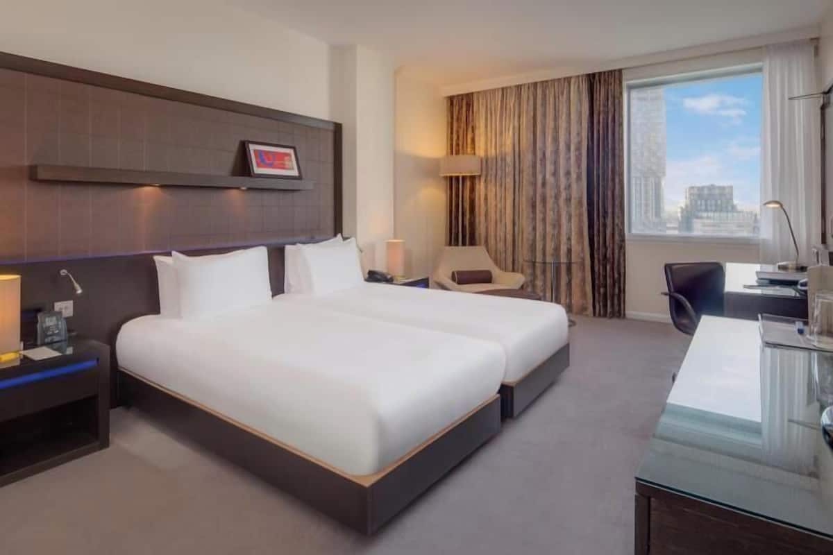 Hypo-allergenic bedding, in-room safe, desk, laptop workspace