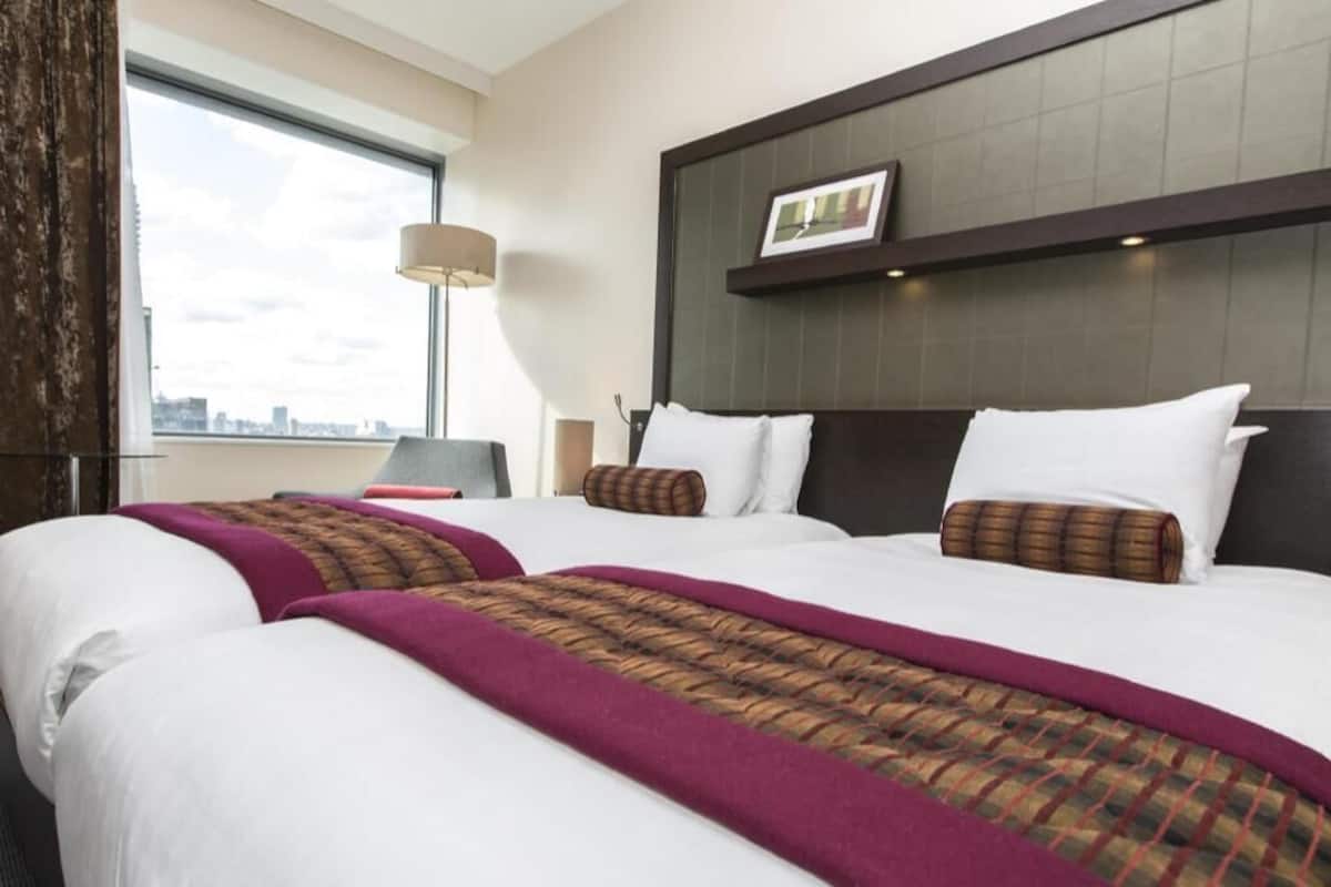 Hypo-allergenic bedding, in-room safe, desk, laptop workspace