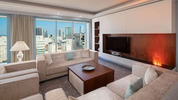 Suite presidencial | Ropa de cama de alta calidad y minibar