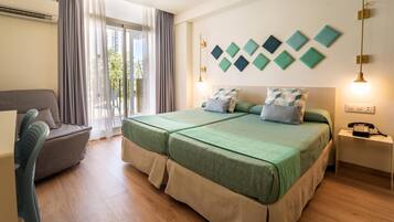 Twin Room, Balcony | In-room safe, desk, free WiFi, bed sheets