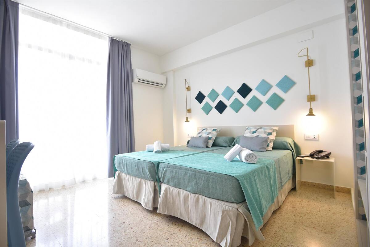 Twin Room, Balcony, Pool View | In-room safe, desk, WiFi (free), bed sheets