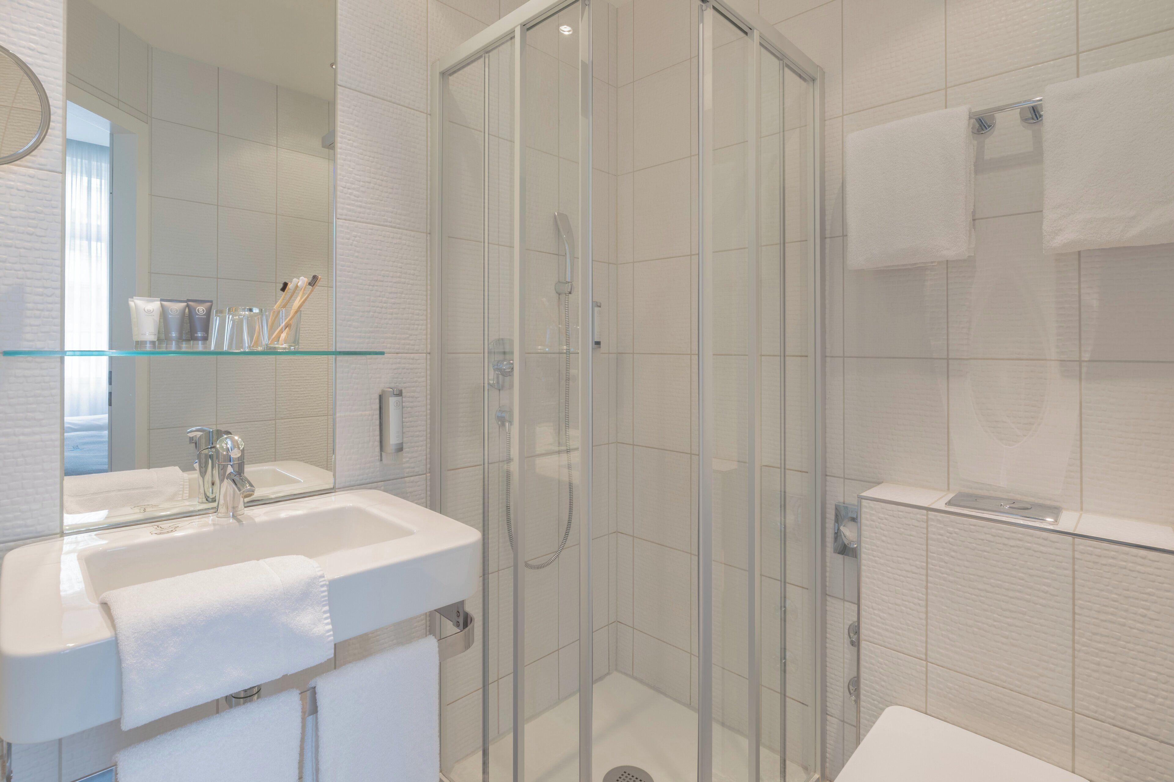 shower, free toiletries, hair dryer, towels