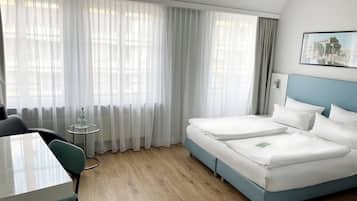 Hypo-allergenic bedding, in-room safe, desk, blackout drapes