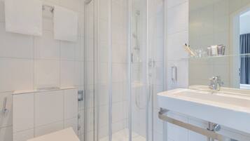 Shower, free toiletries, hair dryer, towels