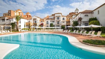 Seasonal outdoor pool, pool umbrellas, pool loungers