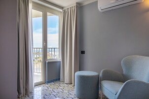 Deluxe Double or Twin Room, Sea View | Minibar, in-room safe, desk, free WiFi