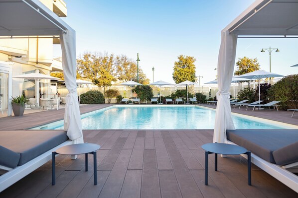 Outdoor pool, pool umbrellas, pool loungers