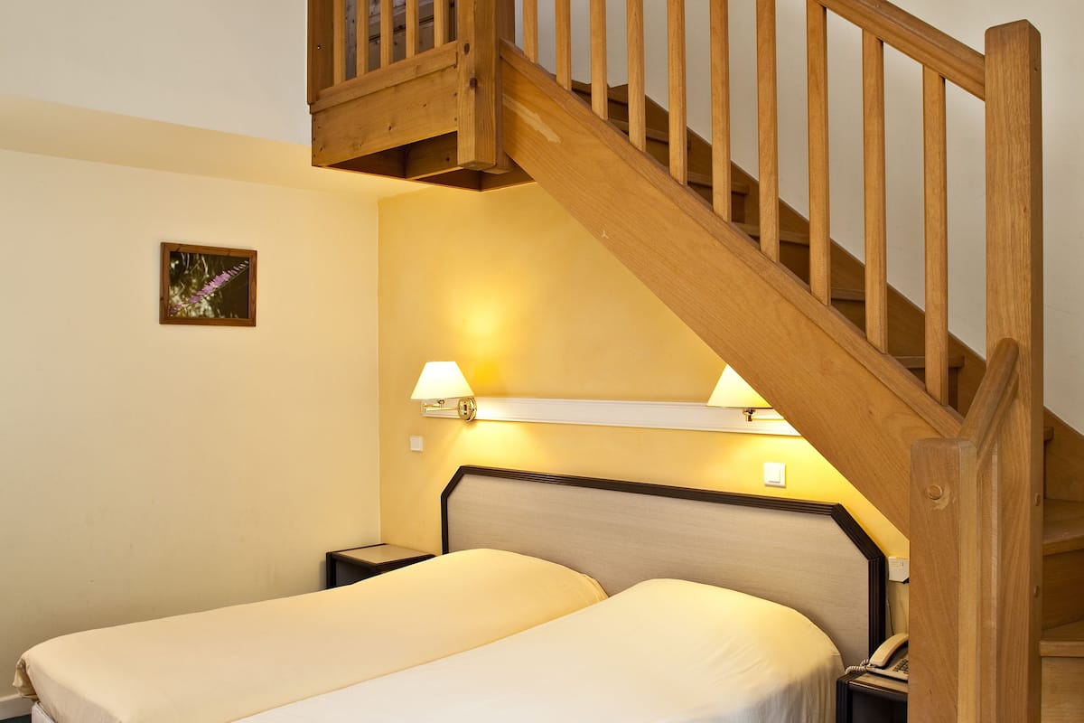 family room | desk, blackout curtains, soundproofing, iron/ironing board