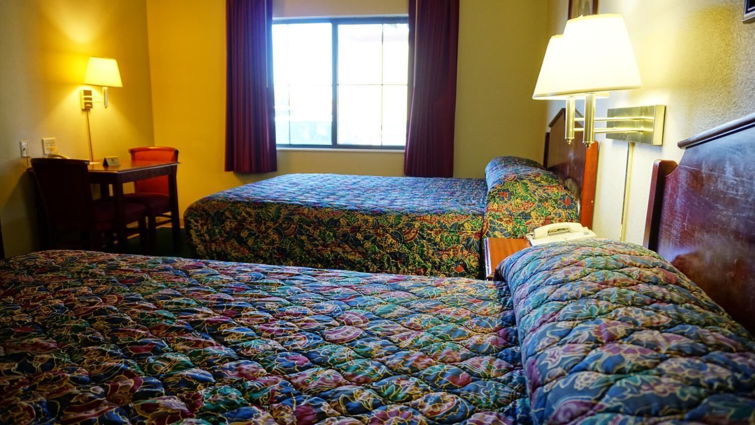 double room, 2 queen beds | blackout curtains, iron/ironing board, free wifi, bed sheets