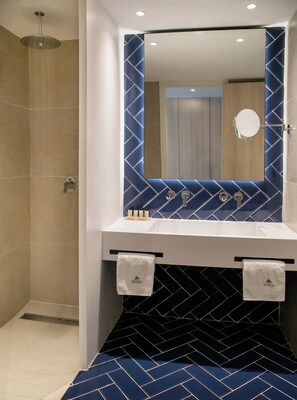 A modern bathroom with a shower, two sinks, and a mirror. - Atlantica Aqua Blue (Paralimni)