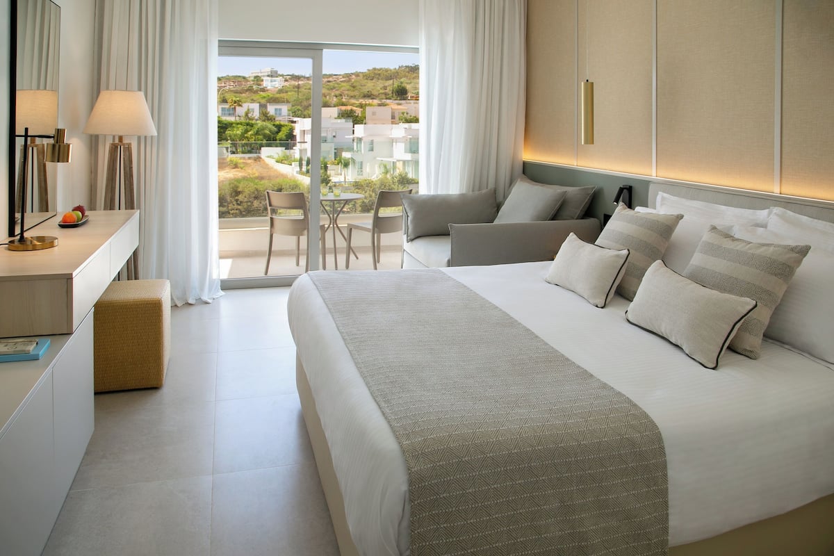 In-room safe, blackout curtains, cots/infant beds