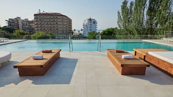 Outdoor pool, open 10:00 AM to 8:00 PM, pool umbrellas, sun loungers