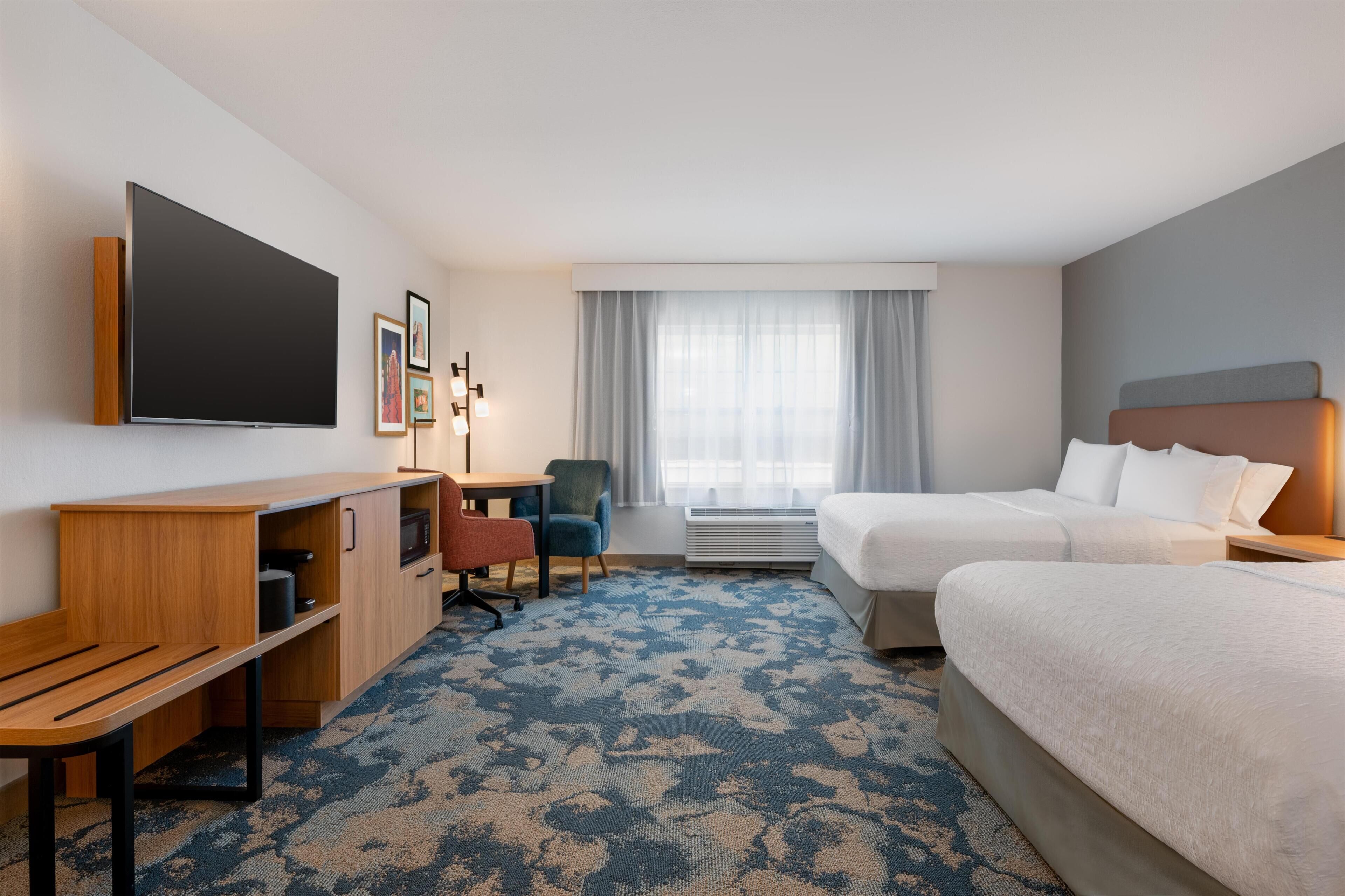 Hypo-allergenic bedding available, down comforters, desk