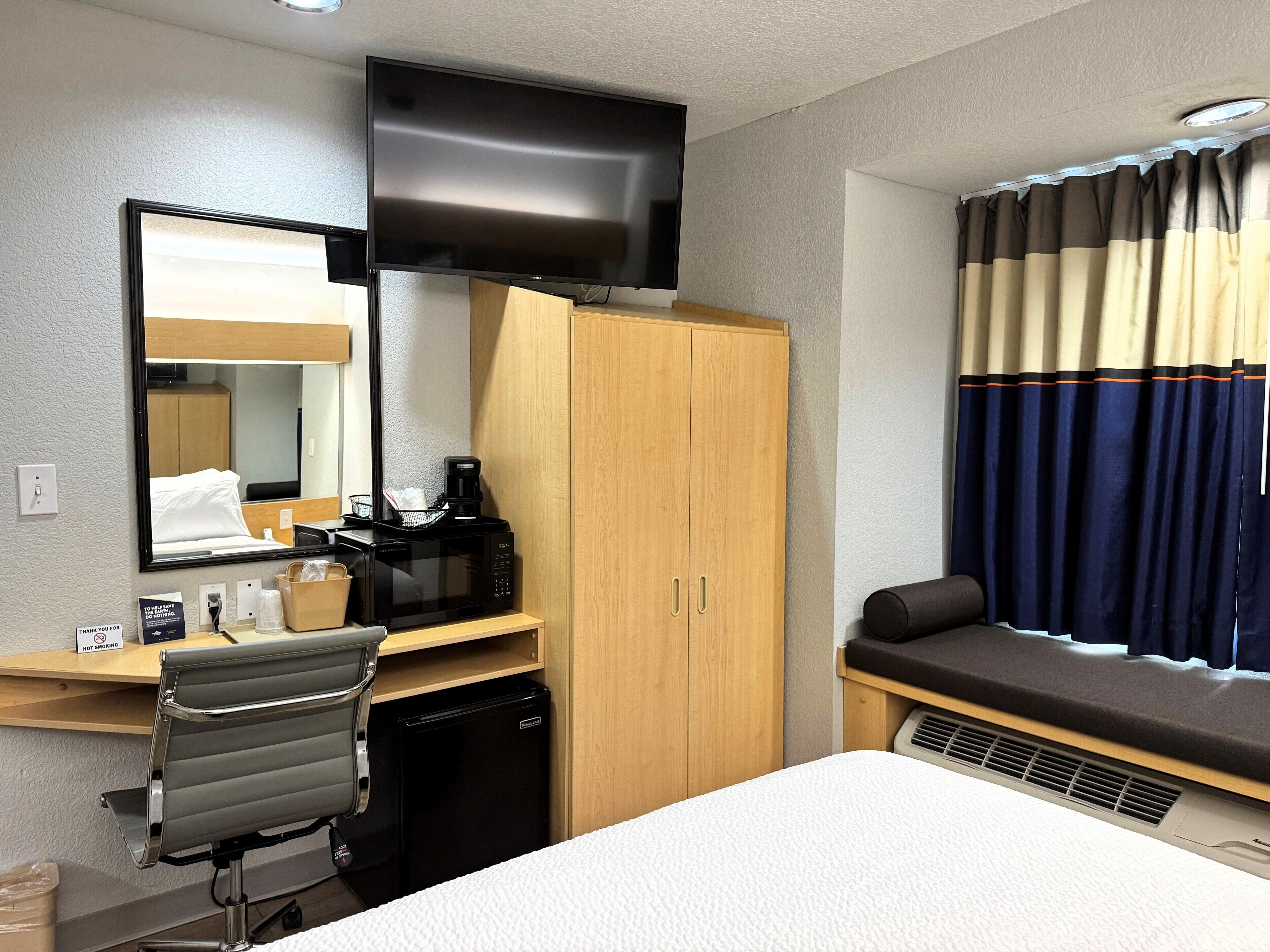 desk, blackout curtains, free wifi, bed sheets