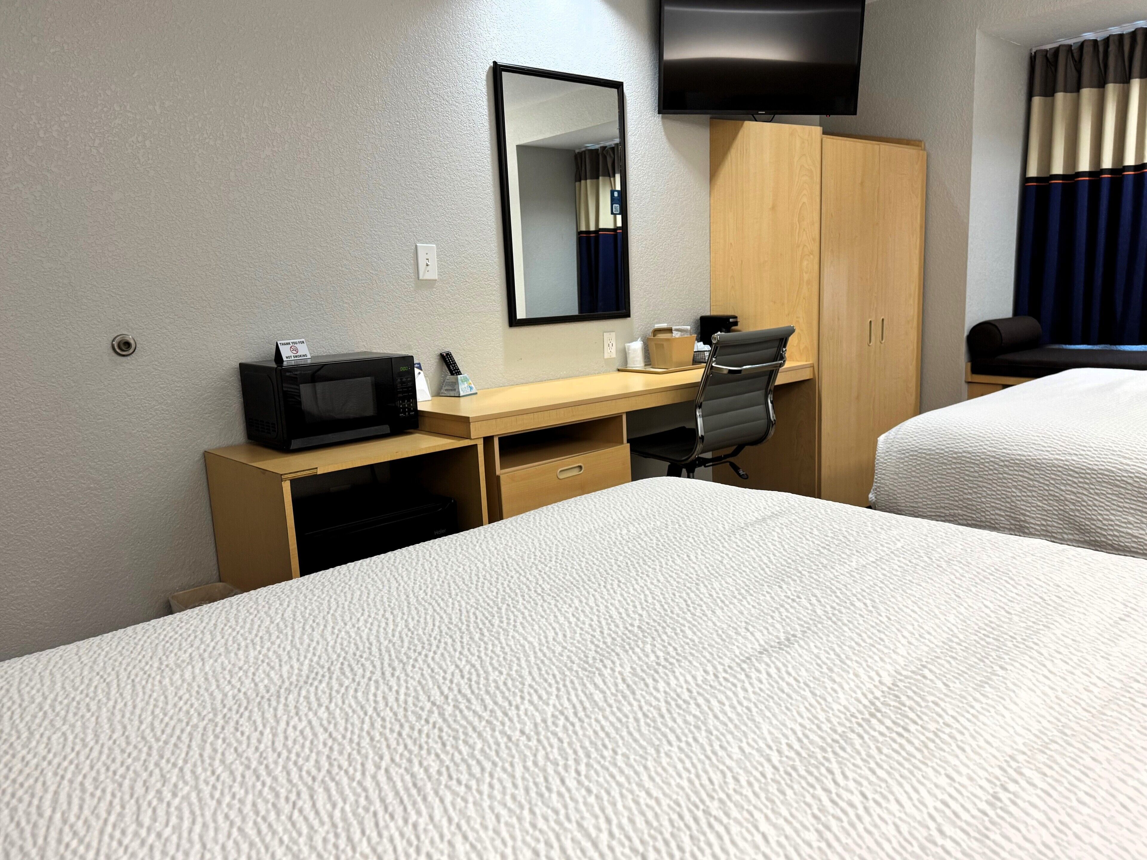 desk, blackout curtains, free wifi, bed sheets