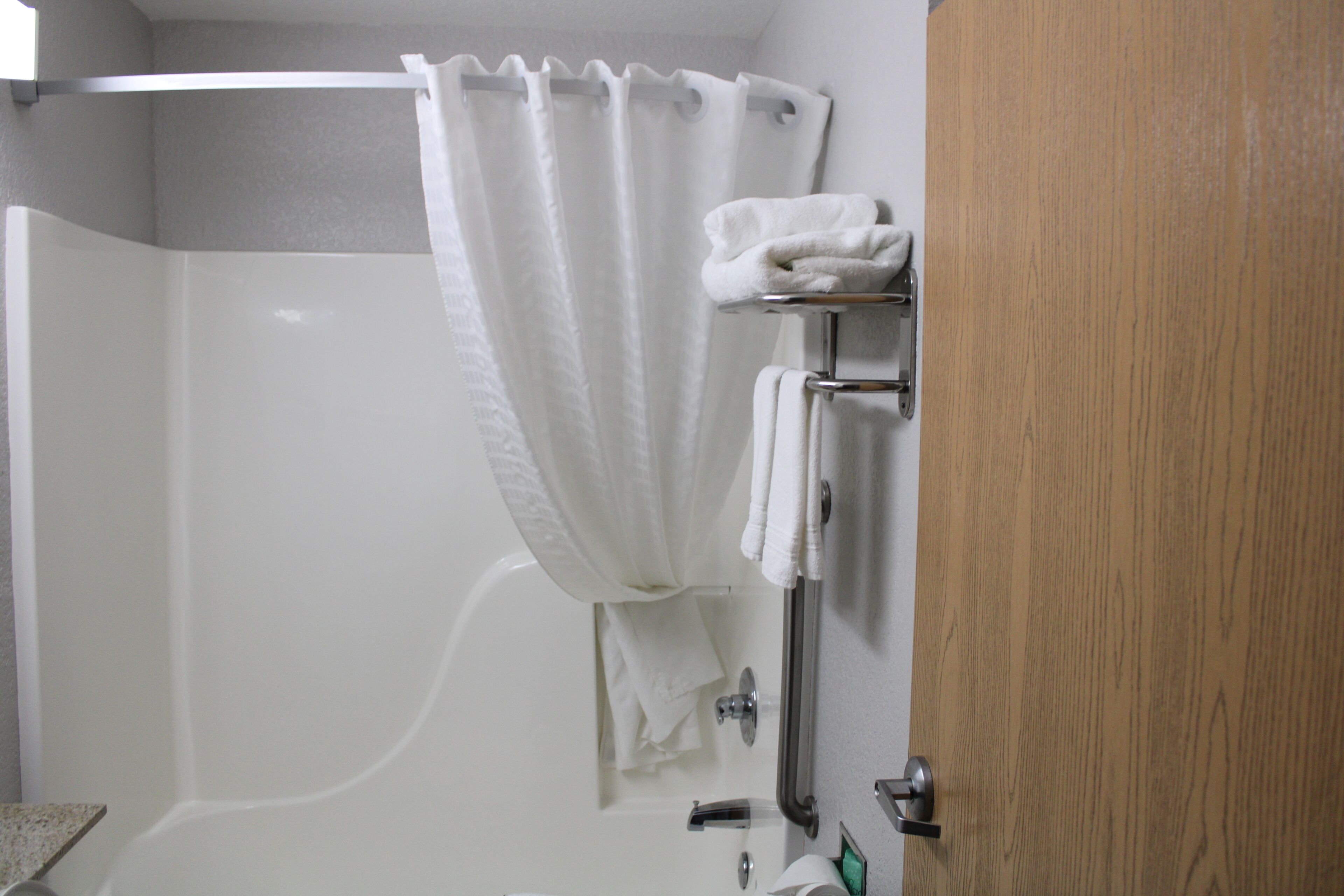 combined shower/bathtub, free toiletries, hair dryer, towels