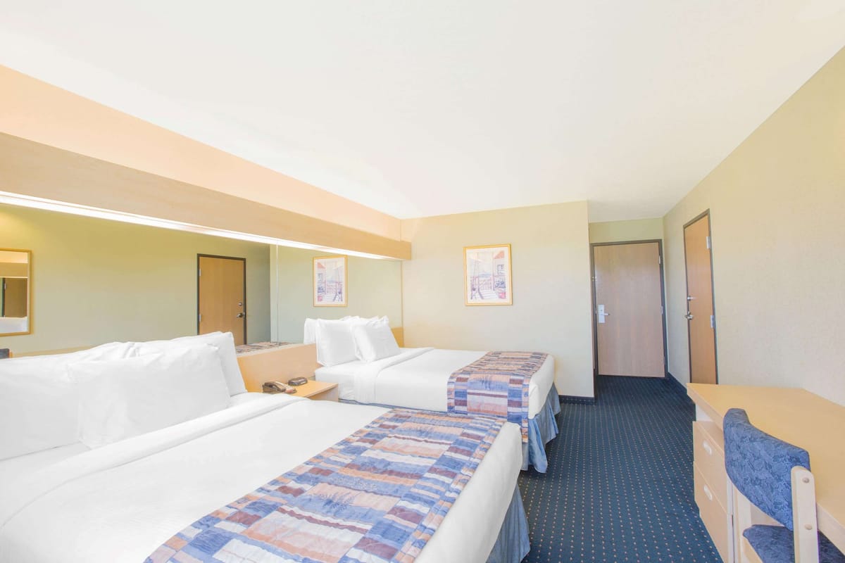 Desk, blackout drapes, WiFi, bed sheets