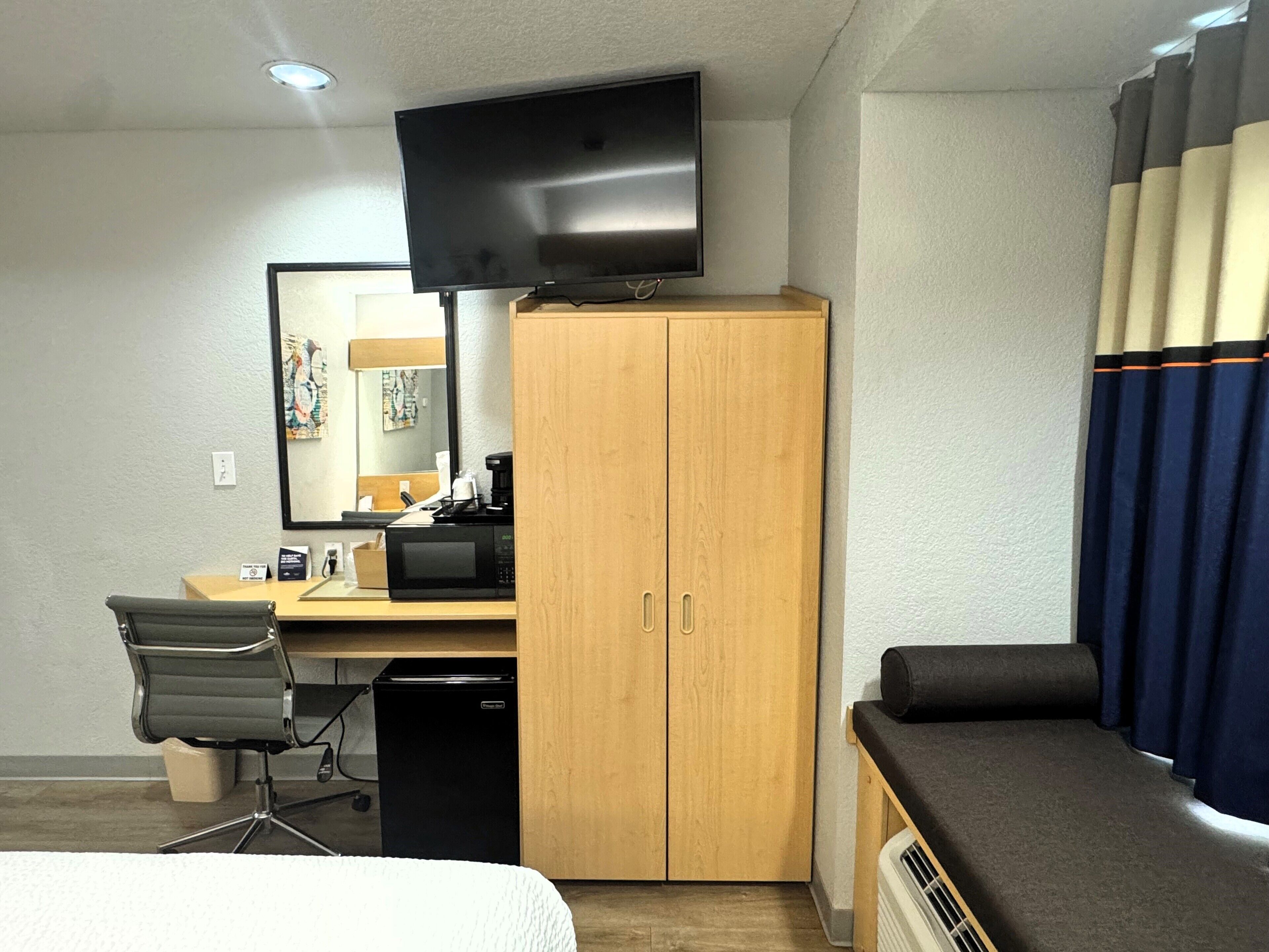 desk, blackout curtains, free wifi, bed sheets