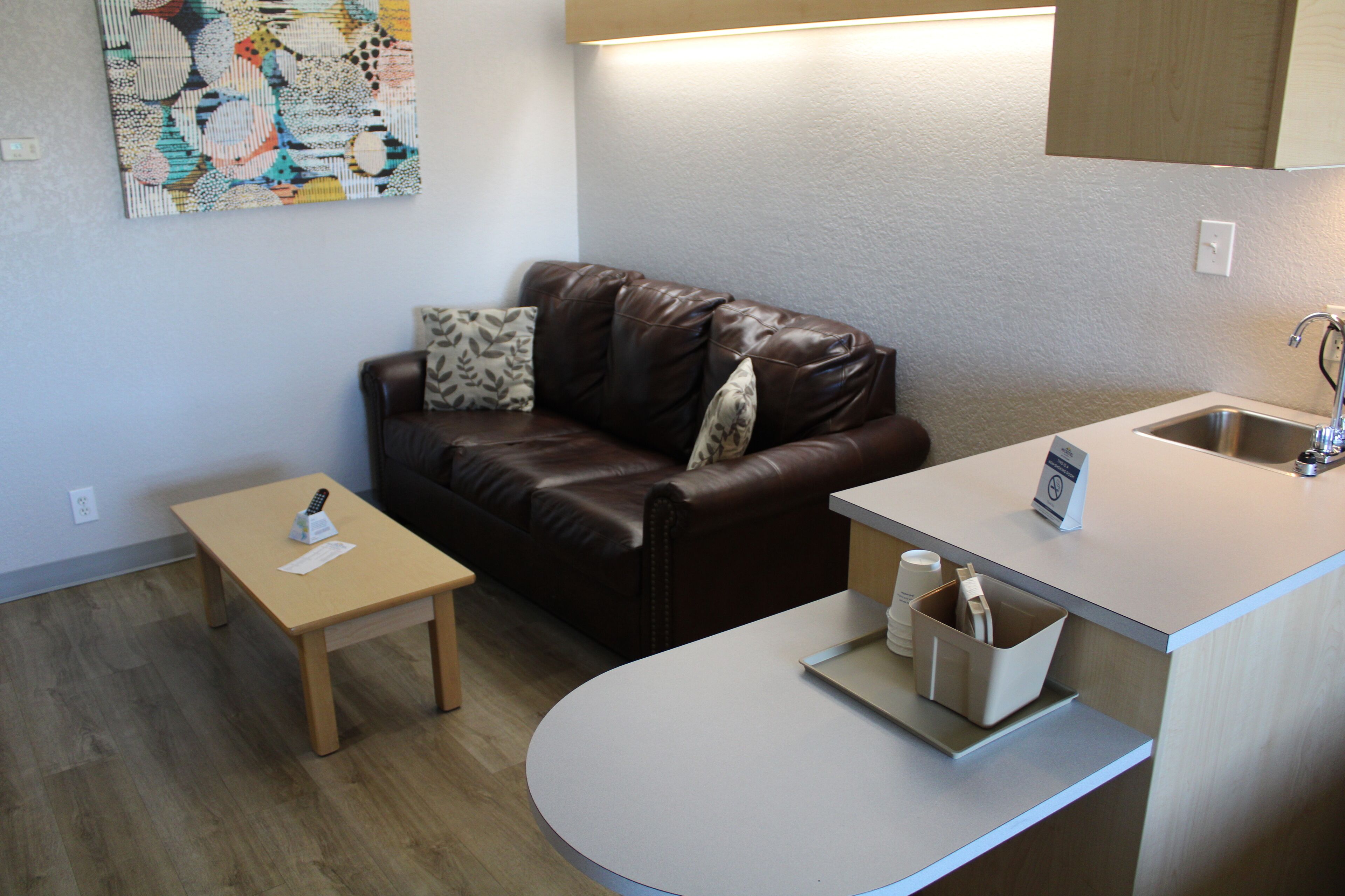 studio suite, 1 queen bed, non smoking | living area | flat-screen tv