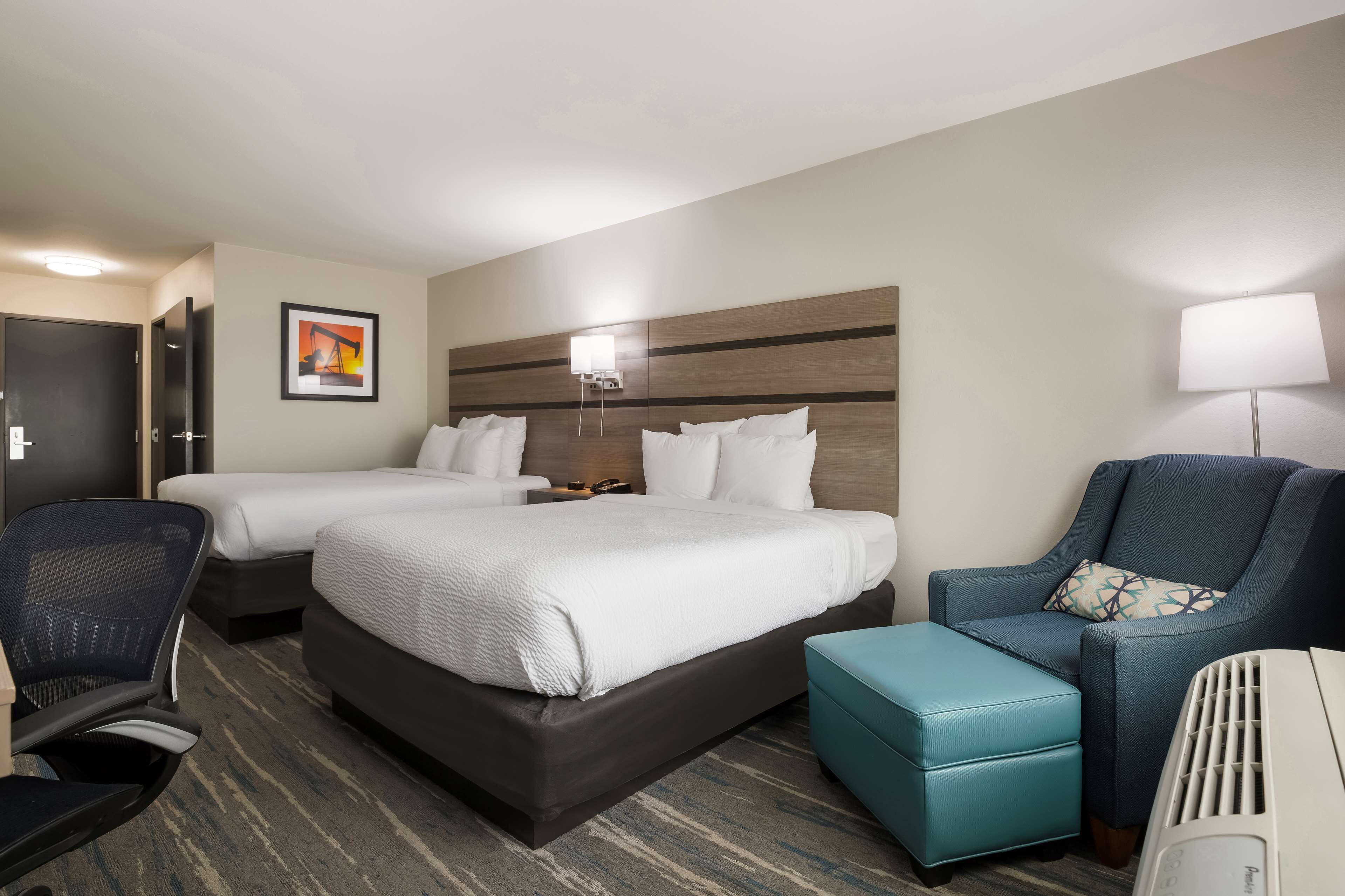 standard room, 2 queen beds, non smoking, refrigerator & microwave | desk, laptop workspace, iron/ironing board, free cots/infant beds