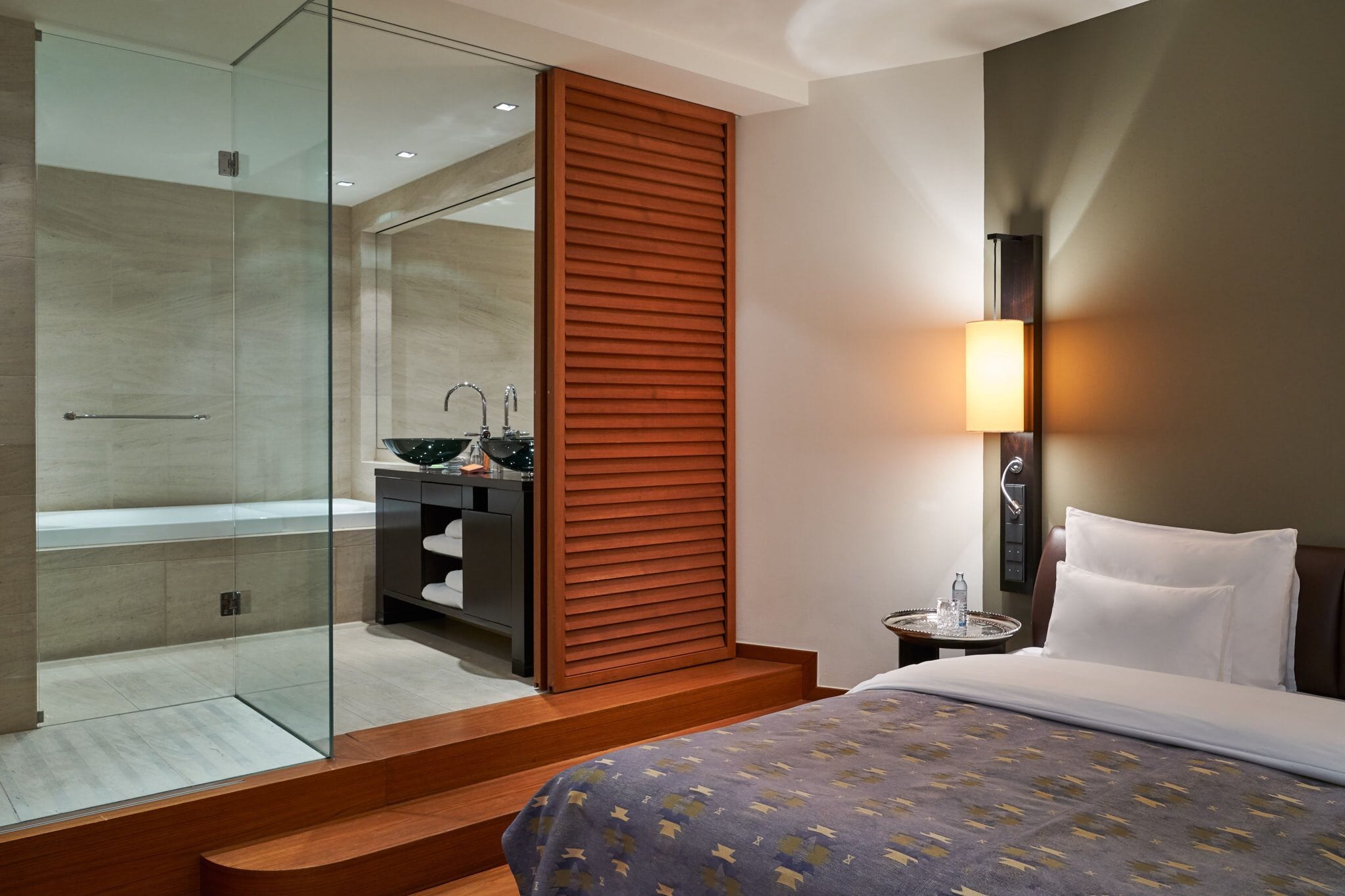 grand suite, city view | bathroom | rainfall showerhead, designer toiletries, hair dryer, bathrobes