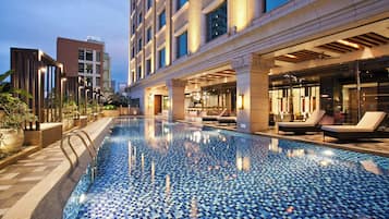 Outdoor pool, pool umbrellas, pool loungers
