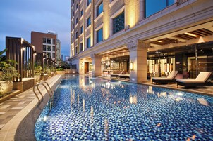 Outdoor pool, pool umbrellas, sun loungers