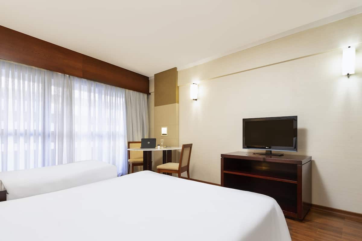 Premium bedding, minibar, in-room safe, blackout drapes