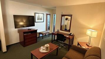 Executive Suite, 1 Queen Bed with Sofa bed / Not Pet friendly | Living area | 65-inch Smart TV with cable channels, DVD player