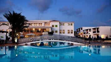 Indoor pool, seasonal outdoor pool, pool umbrellas, sun loungers