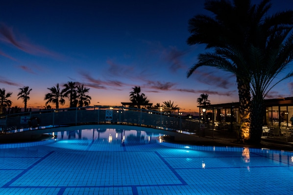 Indoor pool, seasonal outdoor pool, pool umbrellas, sun loungers