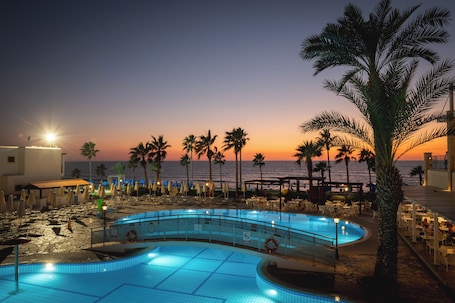 Indoor pool, seasonal outdoor pool, pool umbrellas, sun loungers. Kefalos Beach Tourist Village