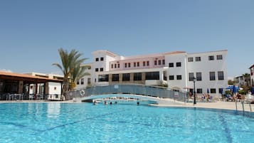 Indoor pool, seasonal outdoor pool, pool umbrellas, sun loungers