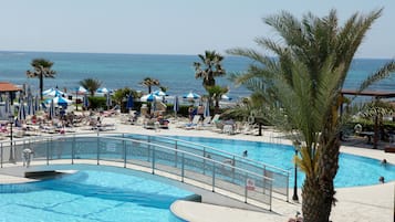 Indoor pool, seasonal outdoor pool, pool umbrellas, sun loungers