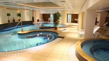 Indoor pool, pool loungers, lifeguards on site