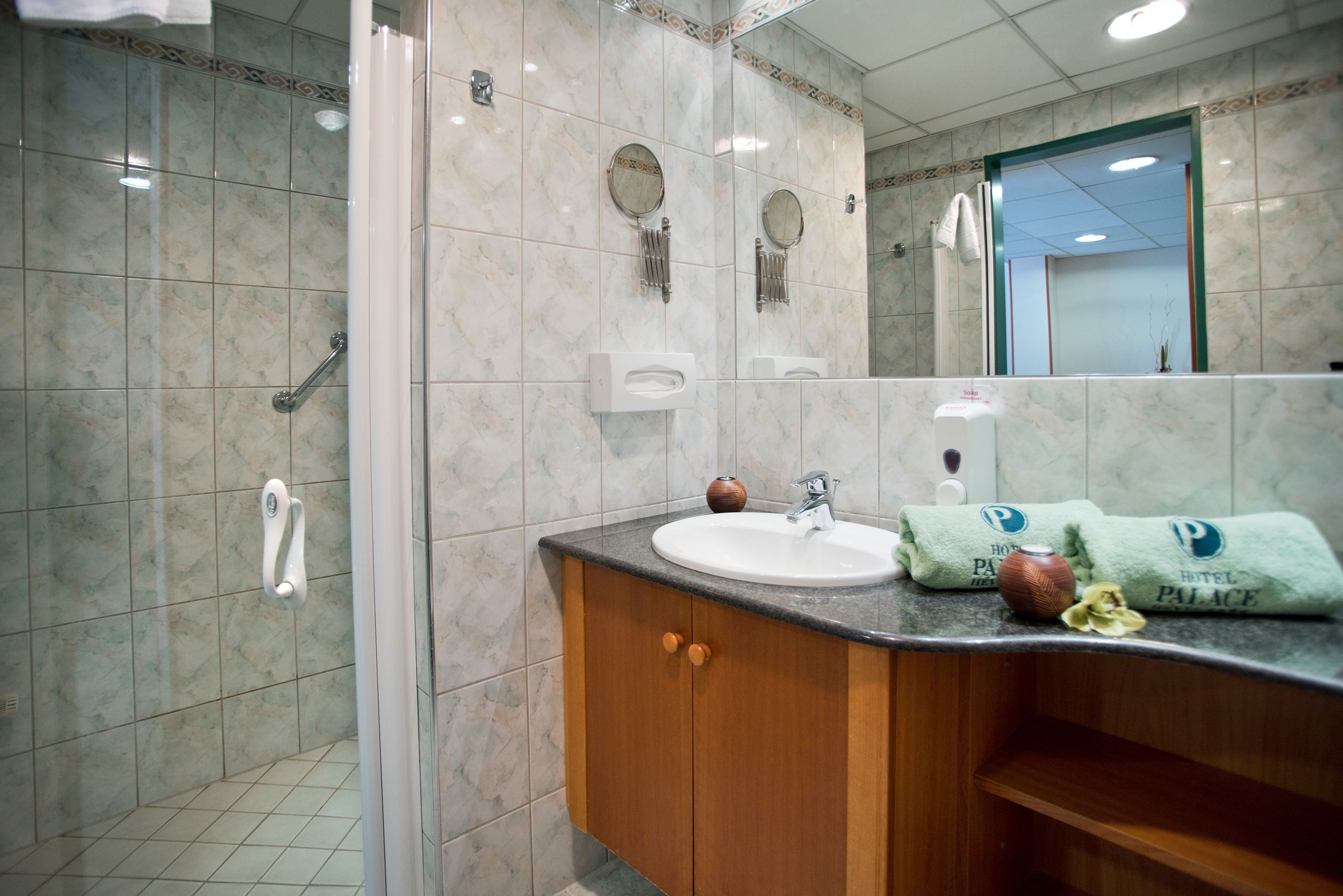 shower, hair dryer, bathrobes, towels