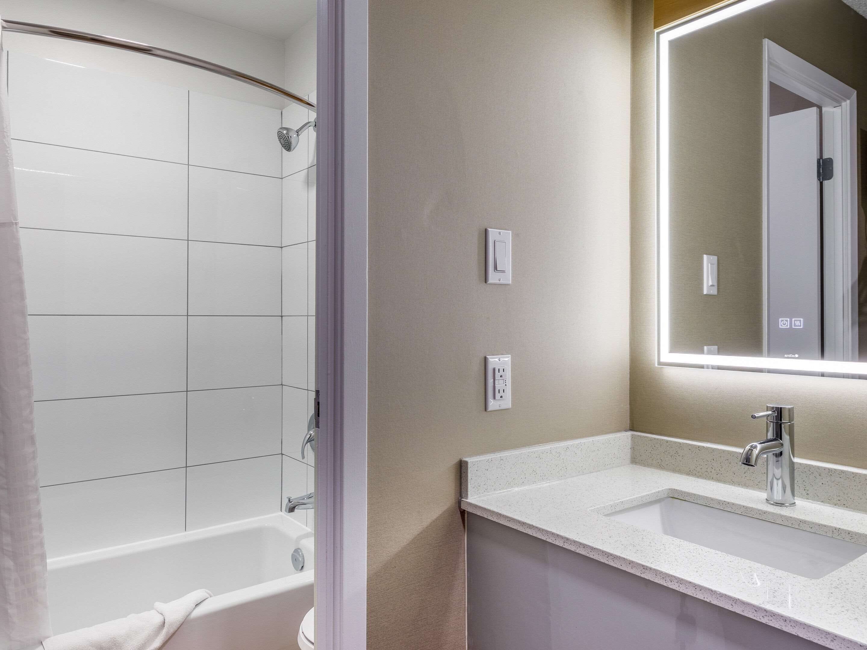 combined shower/bathtub, free toiletries, hair dryer, towels