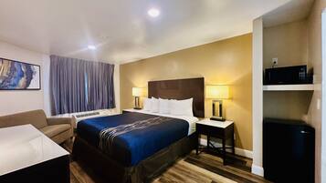 Standard Room, 1 King Bed | Desk, blackout drapes, iron/ironing board, free WiFi