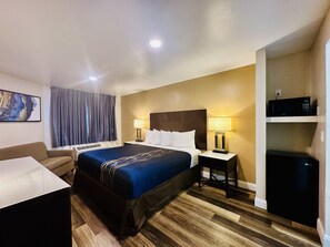 Standard Room, 1 King Bed | Desk, blackout drapes, iron/ironing board, free WiFi