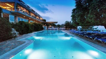 Indoor pool, seasonal outdoor pool, pool umbrellas, pool loungers