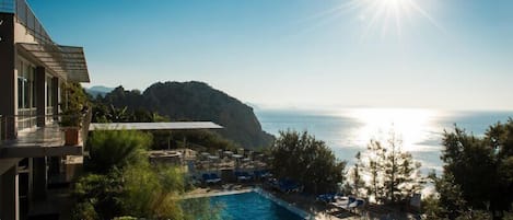 Indoor pool, seasonal outdoor pool, pool umbrellas, sun loungers