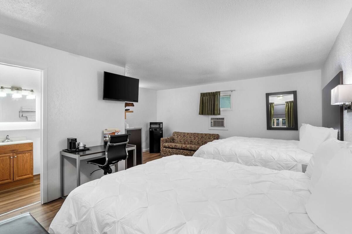 Room, 2 Queen Beds, Non Smoking | Iron/ironing board, rollaway beds, WiFi (free), bed sheets