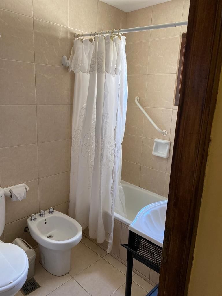 combined shower/bathtub, deep-soaking bathtub, rainfall showerhead