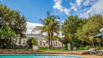 Outdoor pool, pool umbrellas, pool loungers