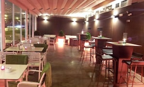 Cocktail bar, al fresco dining, open daily